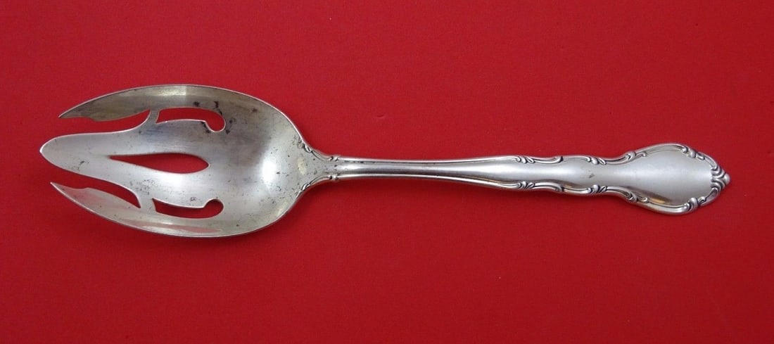 Gorham Andante Sterling Silver Pierced Serving Spoon 8.5": Gorham Andante Sterling Silver Pierced Serving Spoon 8.5" Elevate your dining experience with this exquisite Andante by Gorham Sterling Silver Slotted Serving Spoon. Crafted from high-quality sterling