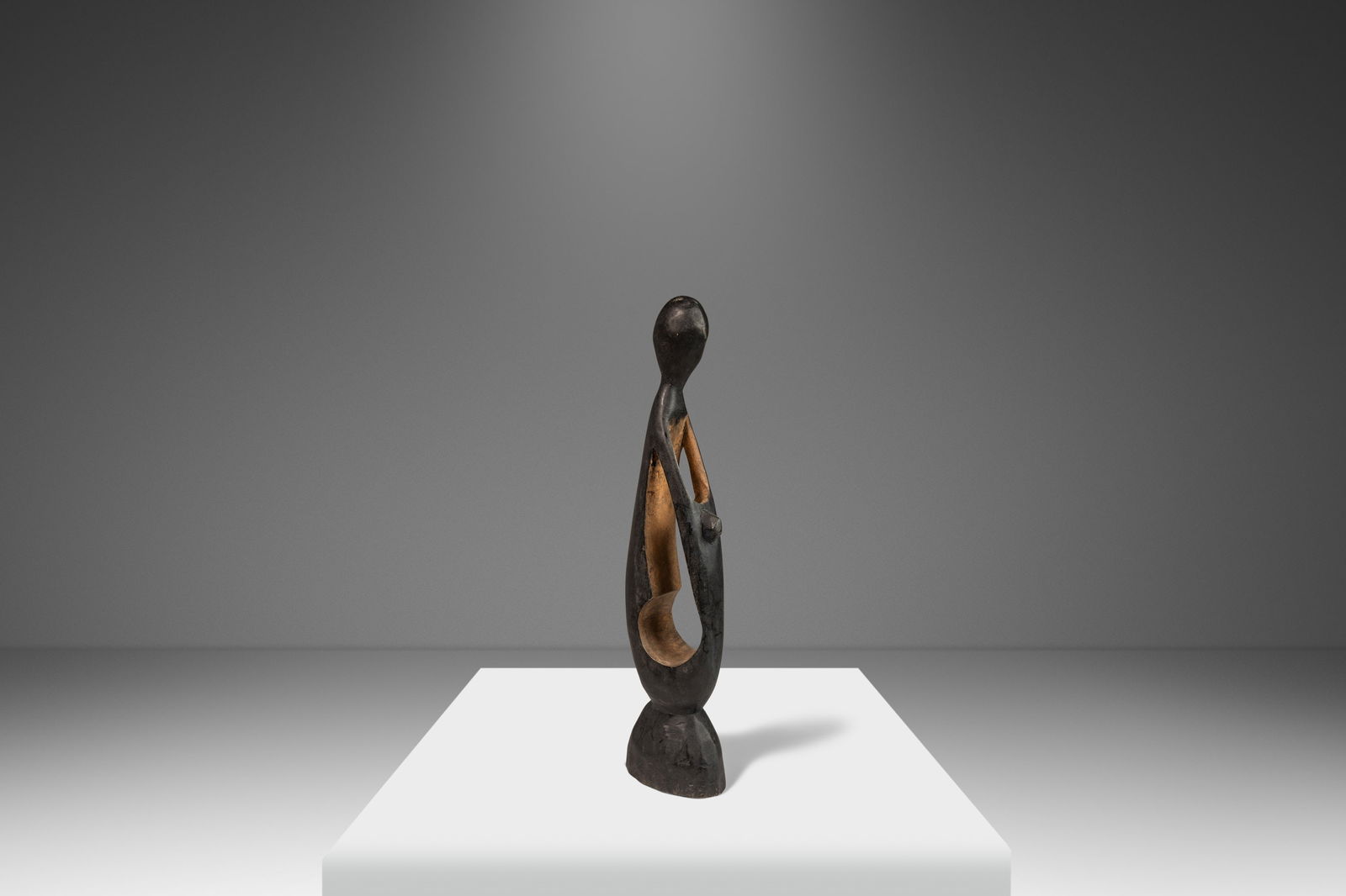 Vintage Post Modern Hand-Carved Walnut Mother & Child Sculpture 1970s: Vintage Post Modern Hand-Carved Walnut Mother & Child Sculpture 1970s Discover a stunning Post Modern Abstract Hand-Carved Sculpture representing the tender embrace of a mother and child. This heartwa