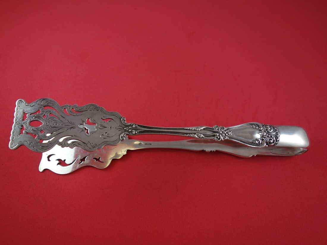 Alvin Sorrento Sterling Silver Sandwich Tong Bright-Cut 10 3/8 Inch: Alvin Sorrento Sterling Silver Sandwich Tong Bright-Cut 10 3/8 Inch Discover the elegance of the Sorrento by Alvin Sterling Silver Sandwich Tong, crafted between 1900 and 1940. This exquisite piece fe
