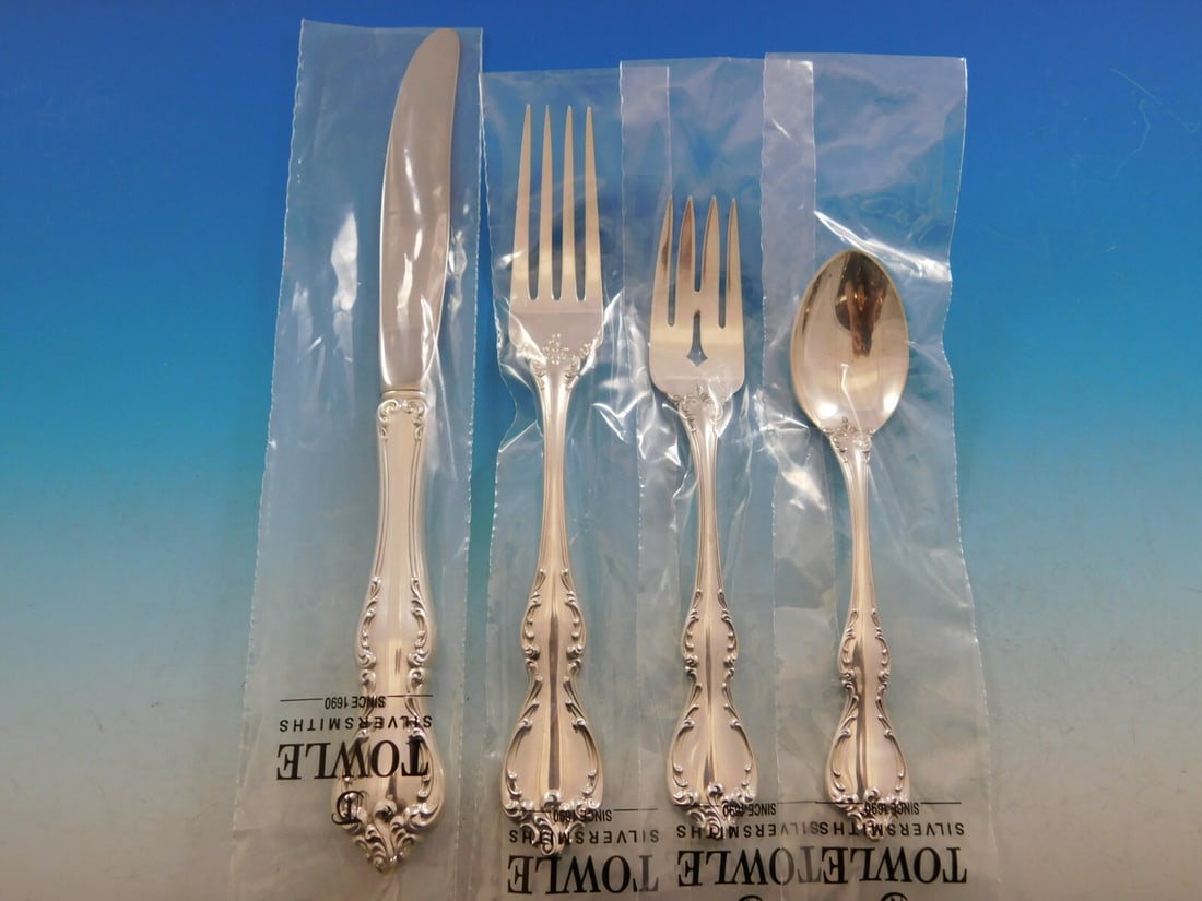 Towle Debussy Sterling Silver Flatware Set for 12 53 pcs with Storage Chest: Towle Debussy Sterling Silver Flatware Set for 12 53 pcs with Storage Chest Discover the elegance of the Debussy Sterling Silver Flatware Set by Towle, designed for 12 people and comprising 53 exquisi