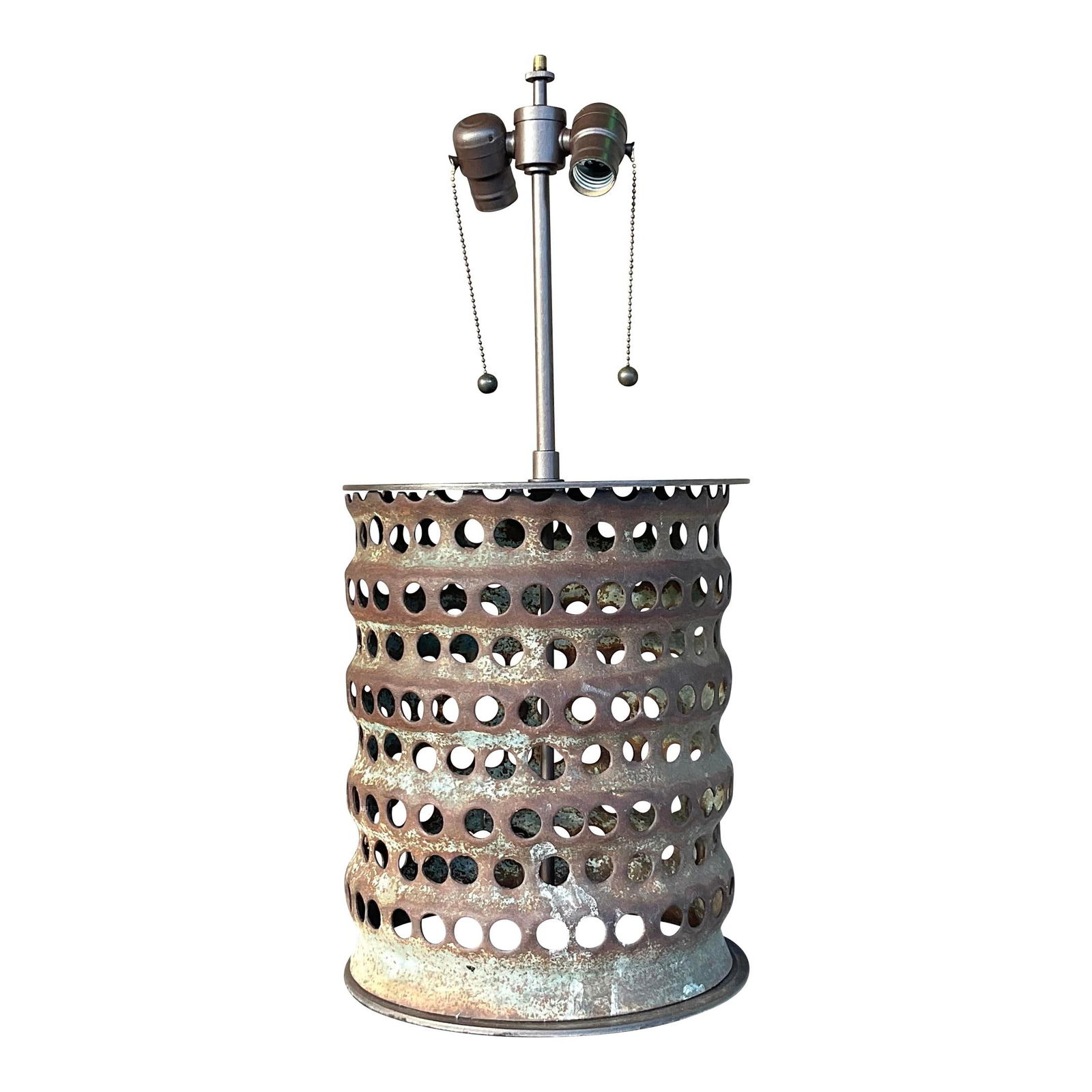 Vintage Boho Punch Cut Metal Cylinder Lamp Greige Finish: Vintage Boho Punch Cut Metal Cylinder Lamp Greige Finish Illuminate your space with this stunning vintage Boho table lamp. Crafted from metal, this chic punch cut cylinder features a beautiful patinat