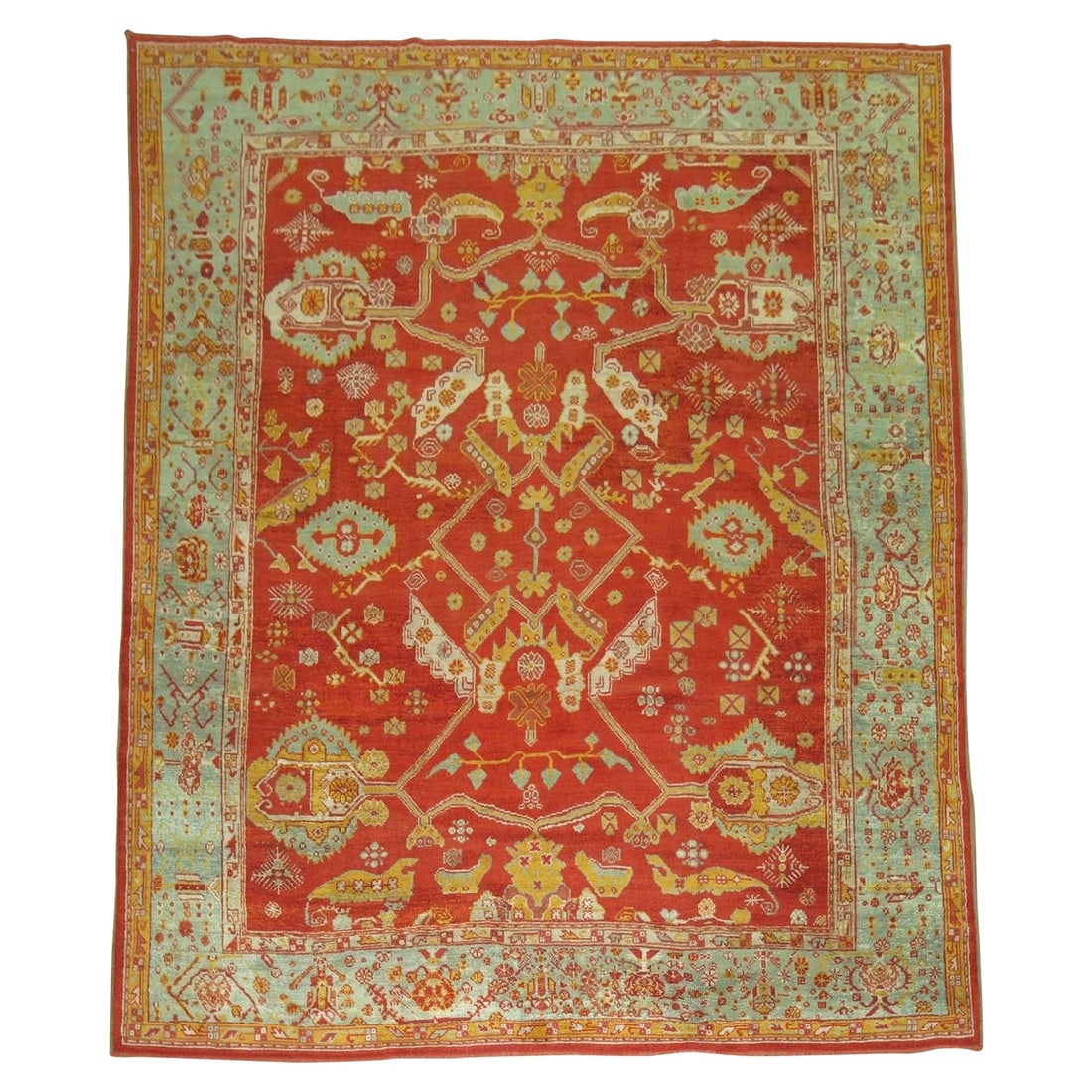 Antique Oushak Rug Room Size Angora Wool circa 1900 Turkey: Antique Oushak Rug Room Size Angora Wool circa 1900 Turkey This exquisite Zabihi Collection Room Size Angora Antique Oushak Rug features a stunning blend of bright red and blue-green hues. Hand-knotte