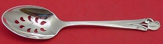 Frank Smith Woodlily Sterling Silver 9-Hole Pierced Serving Spoon: Frank Smith Woodlily Sterling Silver 9-Hole Pierced Serving Spoon This elegant Woodlily serving spoon, crafted by Frank Smith, features a beautiful pierced design with nine holes. Made from high-quali