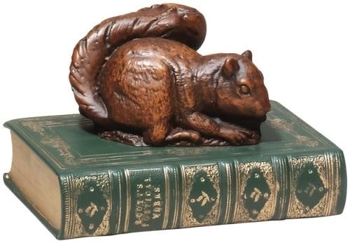 Whimsical Hand-Painted Squirrel Bookend Lodge Decor: Whimsical Hand-Painted Squirrel Bookend Lodge Decor Enhance your lodge decor with this charming hand-painted squirrel bookend. Crafted from durable resin, this unique piece features a delightful desig