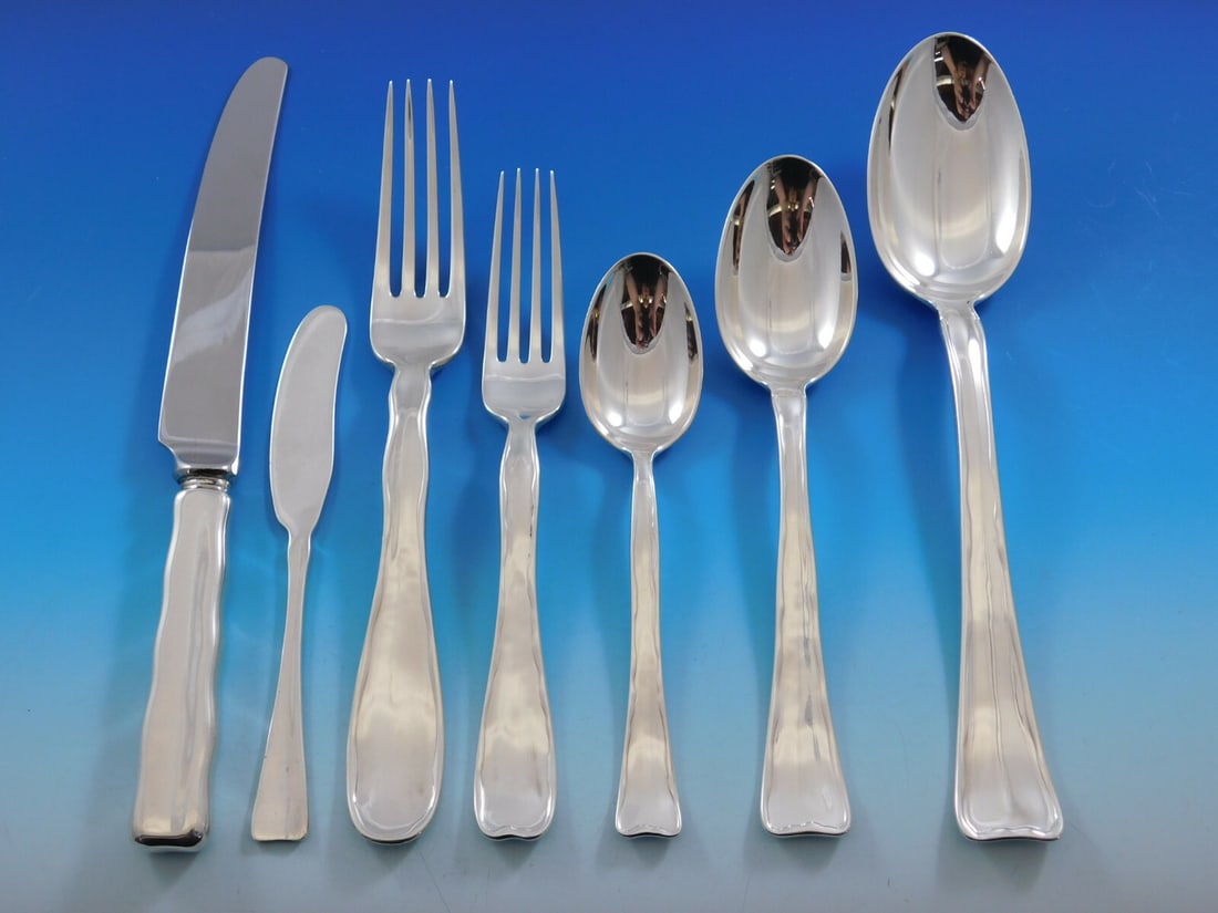 Tiffany & Co. Lap Over Edge Sterling Silver Flatware Set 56 Pcs by Charles Grosjean: Tiffany & Co. Lap Over Edge Sterling Silver Flatware Set 56 Pcs by Charles Grosjean Discover the elegance of the Lap Over Edge pattern in this stunning 56-piece flatware set by Tiffany & Co. Crafted f