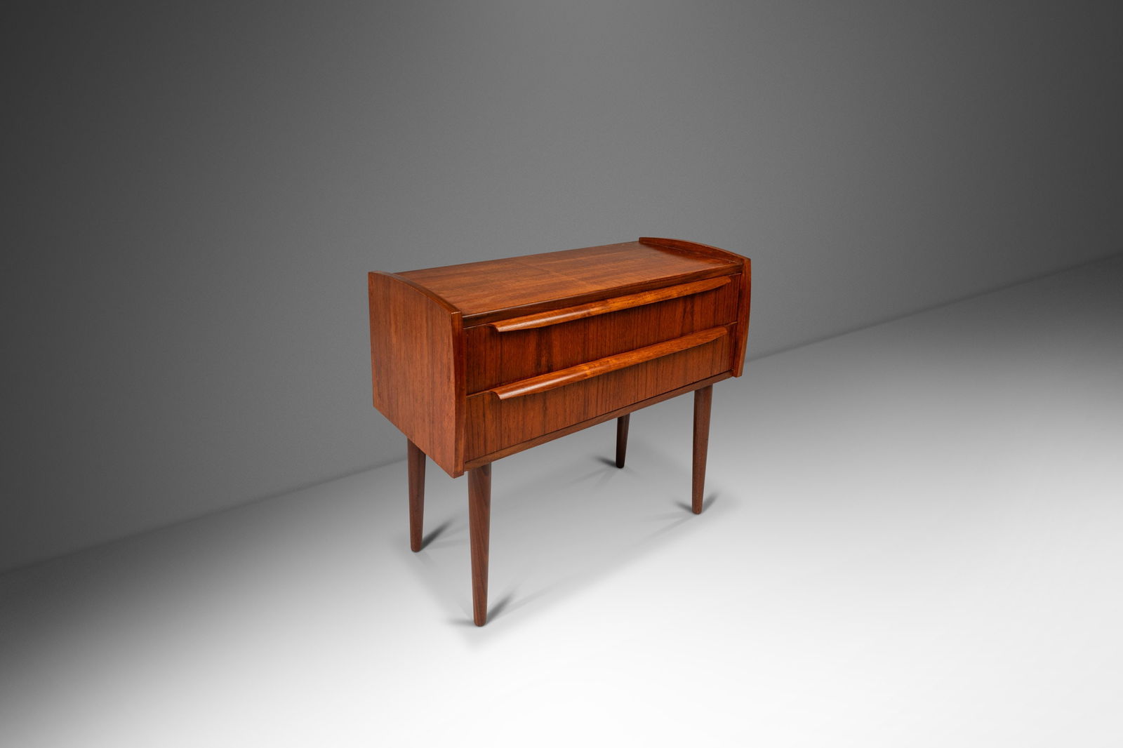 Danish Modern 2-Drawer Accent Table in Teak 1960s: Danish Modern 2-Drawer Accent Table in Teak 1960s This Petite Danish Mid-Century Modern 2-Drawer Side Table embodies the essence of Danish design with its elegant simplicity and functional charm. Craf