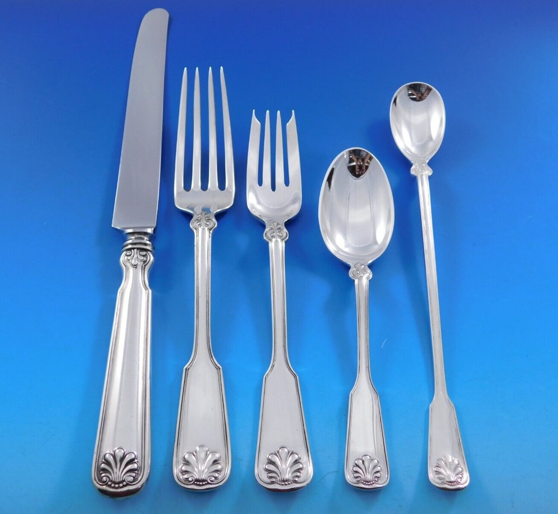 Tiffany & Co Shell & Thread Sterling Silver Flatware Set 40 pcs Service for 8: Tiffany & Co Shell & Thread Sterling Silver Flatware Set 40 pcs Service for 8 Elevate your dining experience with the exquisite Shell & Thread Sterling Silver Flatware Set by Tiffany & Co. This set, c