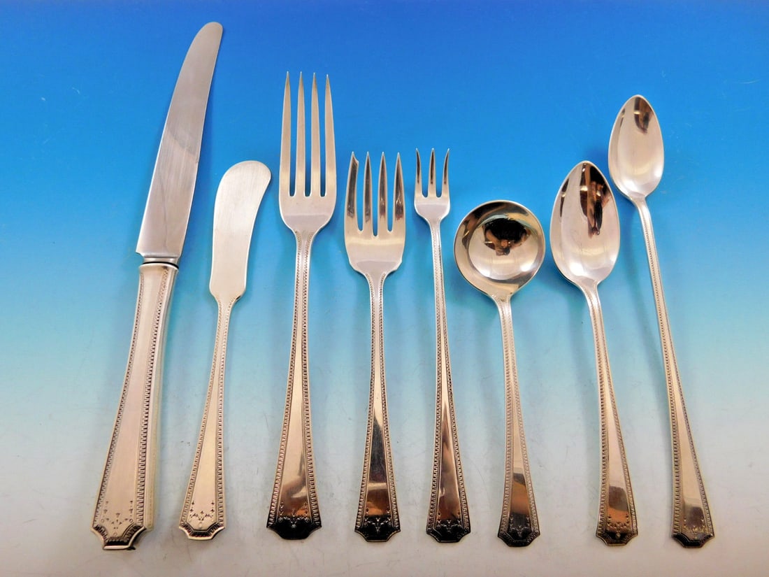 Adam National Sterling Silver Flatware Set 102 Pc for 12 Service: Adam National Sterling Silver Flatware Set 102 Pc for 12 Service Introducing the exquisite Adam by National Sterling Silver Flatware Set, a stunning collection crafted between 1900 and 1940. This monu