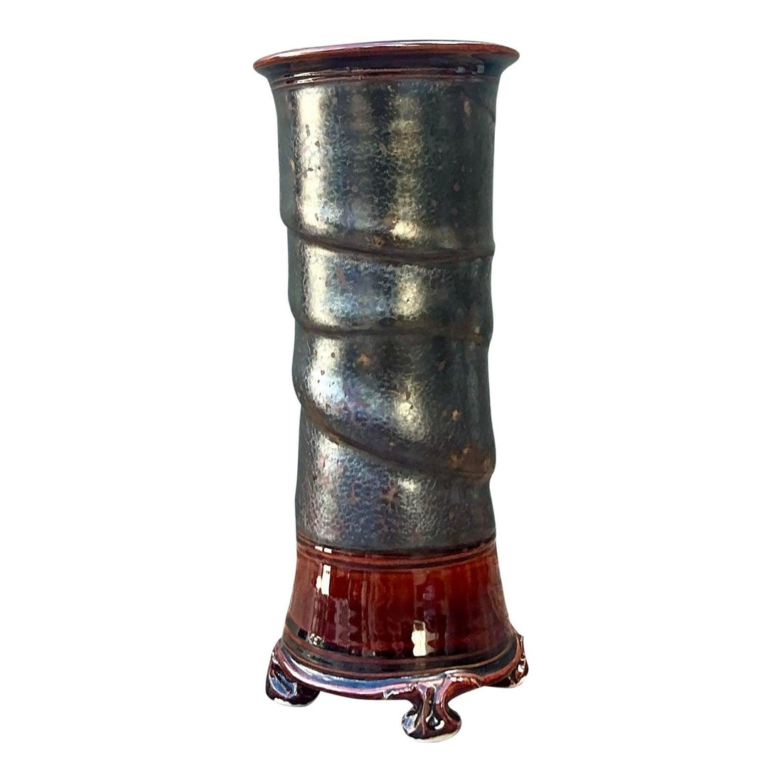 Vintage 1970s Studio Pottery Vase with Metallic Glaze: Vintage 1970s Studio Pottery Vase with Metallic Glaze This vintage studio pottery vase is a stunning example of ceramic artistry, showcasing a sculptural, helical design that draws the eye. Hand-throw