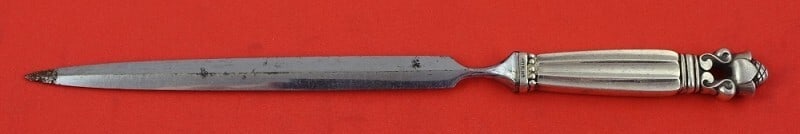 Georg Jensen Acorn Sterling Silver Letter Opener 6 1/4 inches GI Mark: Georg Jensen Acorn Sterling Silver Letter Opener 6 1/4 inches GI Mark This elegant letter opener from the renowned Acorn pattern by Georg Jensen showcases a beautiful sterling silver hollow handle pai