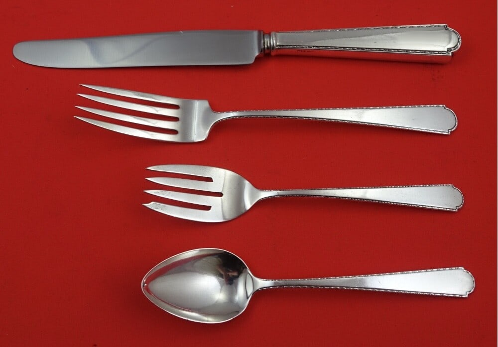 Weidlich Virginia Sterling Silver 4-Piece Place Setting: Weidlich Virginia Sterling Silver 4-Piece Place Setting Enhance your dining experience with this elegant 4-piece place setting from the Virginia Sterling pattern by Weidlich. Crafted from high-quality