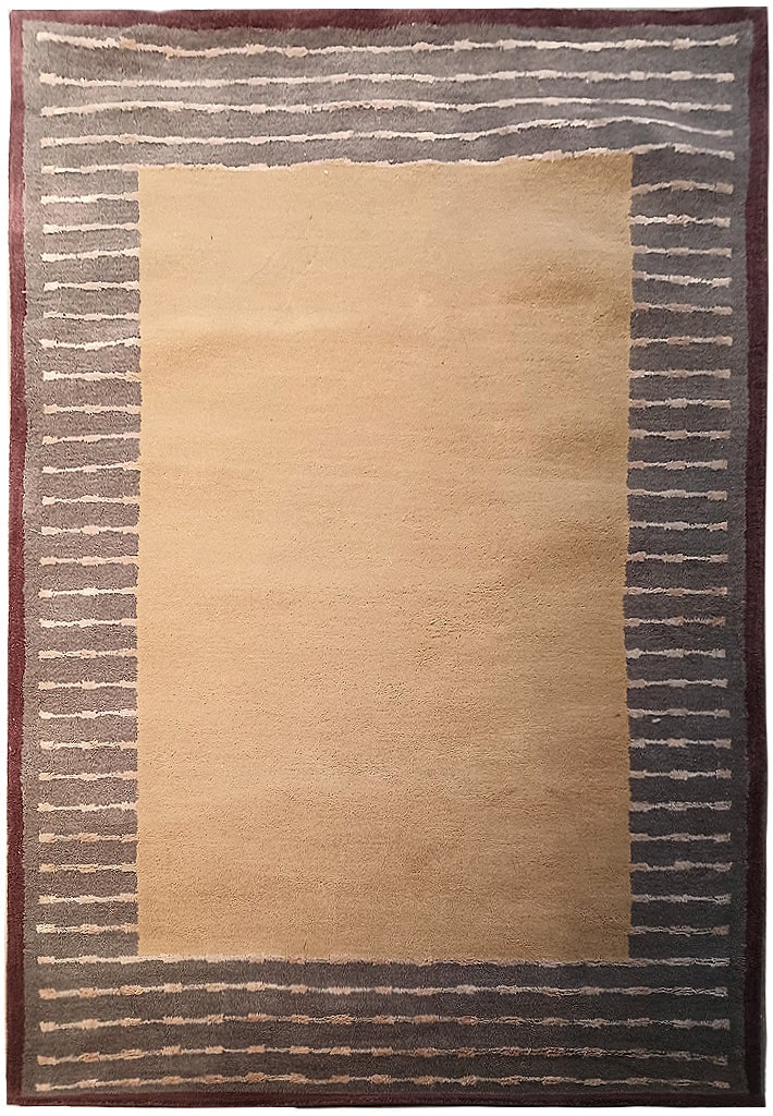 5' x 8' Handcrafted Modern Wool Area Rug with Border: 5' x 8' Handcrafted Modern Wool Area Rug with Border Free continental US Shipping Introduce sophistication and simplicity to your space with this 5' x 8' Modern Wool Rug Plain with Border. Handcrafted