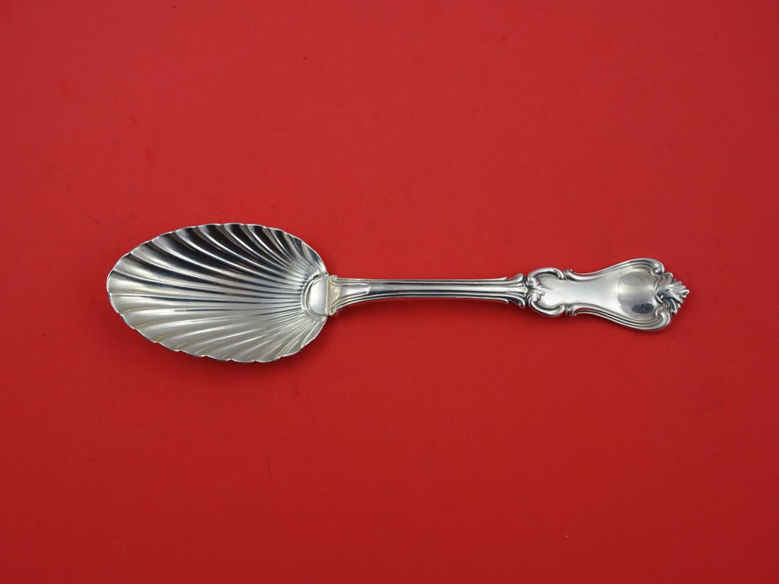 Victorian Sterling Silver Berry Spoon Shell Bowl London 1836: Victorian Sterling Silver Berry Spoon Shell Bowl London 1836 This exquisite English Victorian Sterling Silver Berry Spoon features a stunning shell-shaped bowl, crafted in London in 1836. Measuring 8