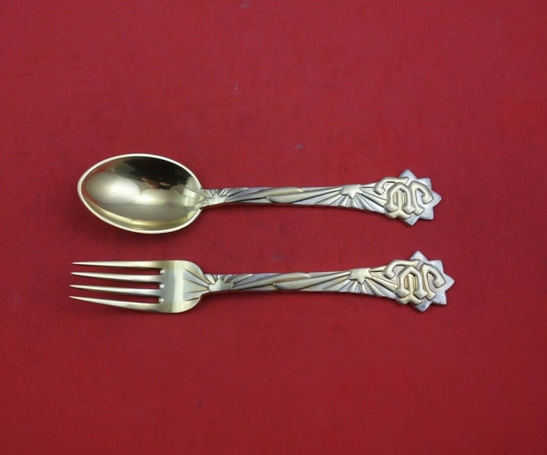 A. Michelsen Christmas Sterling Silver Vermeil Fork and Spoon Set 2pc 1910: A. Michelsen Christmas Sterling Silver Vermeil Fork and Spoon Set 2pc 1910 Enhance your holiday dining experience with this exquisite 2-piece fork and spoon set from A. Michelsen, crafted from sterlin