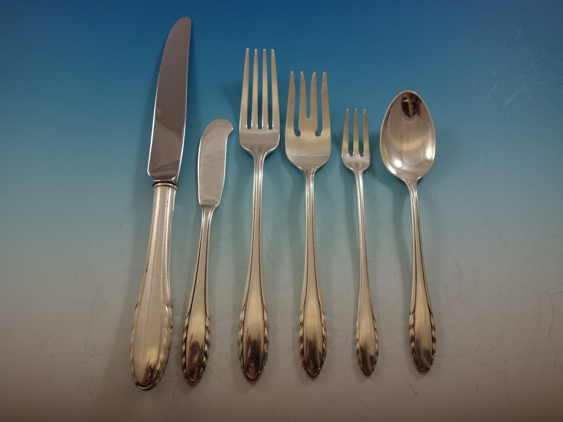 Gorham Lyric Sterling Silver Flatware Set for 8 - 54 Pieces: Gorham Lyric Sterling Silver Flatware Set for 8 - 54 Pieces This exquisite Lyric flatware set by Gorham is crafted from high-quality sterling silver and is designed to serve eight. The set includes a