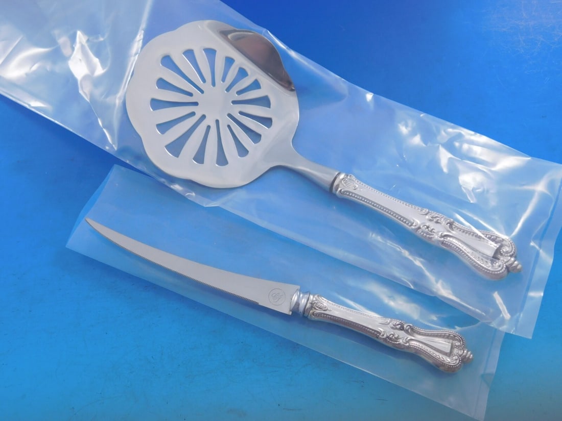 Towle Old Colonial Sterling Silver 2-Piece Tomato Serving Set: Towle Old Colonial Sterling Silver 2-Piece Tomato Serving Set Enhance your dining experience with this exquisite 2-piece Tomato Serving Set from Towle, crafted in the classic Old Colonial pattern. Thi