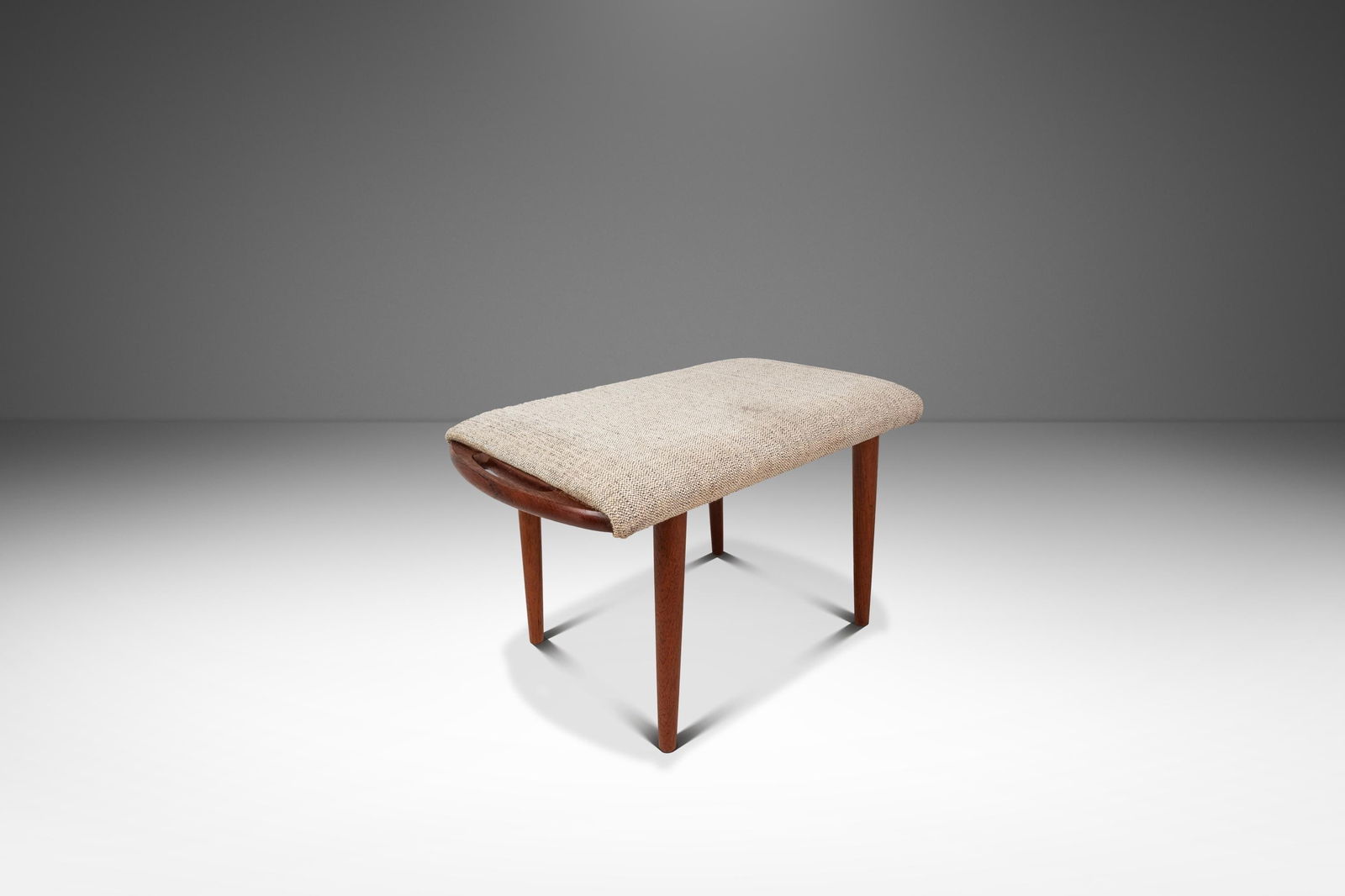 Teak Danish Modern Footstool Ottoman Inspired by Hans Wegner 1980s: Teak Danish Modern Footstool Ottoman Inspired by Hans Wegner 1980s This Danish Mid-Century Modern foot stool or ottoman, styled after Hans Wegner's iconic designs, features a solid Burmese teak frame