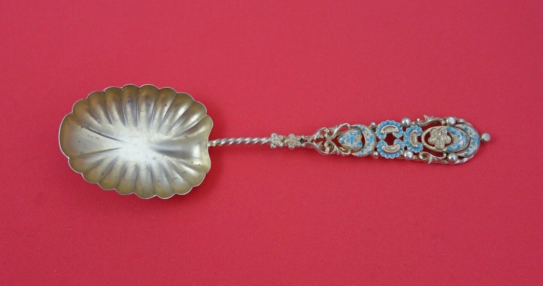 Enameled Sterling Silver Sugar Spoon by Whiting with Turquoise Enamel 5 7/8": Enameled Sterling Silver Sugar Spoon by Whiting with Turquoise Enamel 5 7/8" This exquisite sugar spoon features a stunning enameled sterling design by various makers, prominently showcasing a beautif