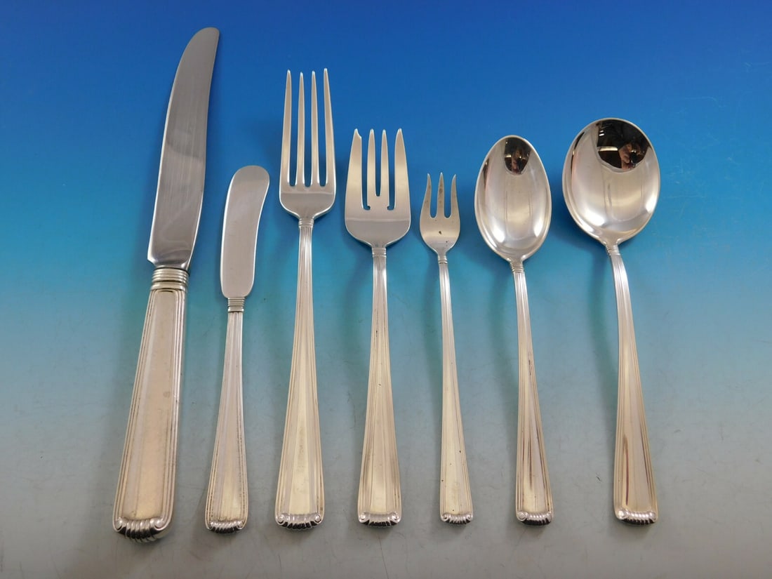 Cartier Marie Louise Sterling Silver Flatware Set 112 pcs for 12: Cartier Marie Louise Sterling Silver Flatware Set 112 pcs for 12 Presenting the exquisite Marie Louise flatware set by Cartier, crafted from high-quality sterling silver. This post-1940 set features t