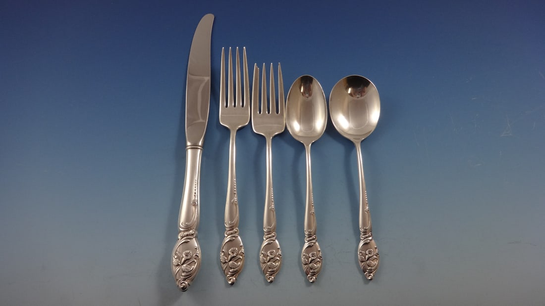 Westmorland Enchanting Orchid Sterling Silver Flatware Set 46 Pcs with Storage Chest: Westmorland Enchanting Orchid Sterling Silver Flatware Set 46 Pcs with Storage Chest Elevate your dining experience with the Enchanting Orchid flatware service by Westmorland. This exquisite sterling