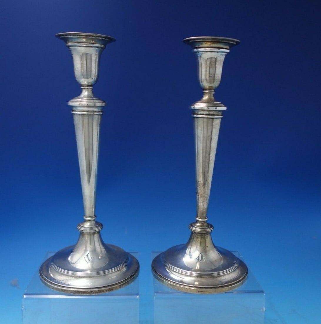 RC English Sterling Silver Monogrammed Candlestick Pair 10 3/4 in: RC English Sterling Silver Monogrammed Candlestick Pair 10 3/4 in This exquisite pair of RC English sterling silver candlesticks stands at 10 3/4" tall and features a base width of 4 3/4". Crafted wit