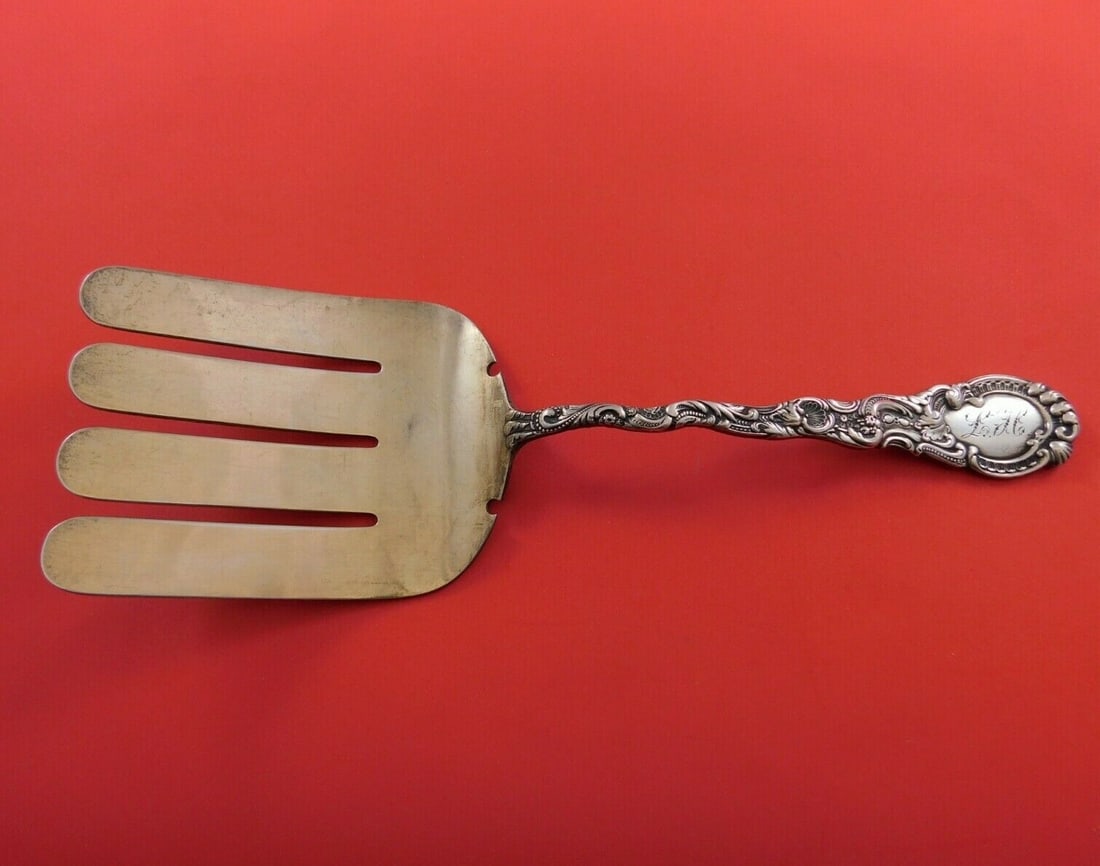 Durgin Louis XV Sterling Silver Asparagus Fork Gold Washed 9.5": Durgin Louis XV Sterling Silver Asparagus Fork Gold Washed 9.5" This exquisite Louis XV asparagus serving fork by Durgin is a stunning addition to any table setting. Crafted from high-quality sterling