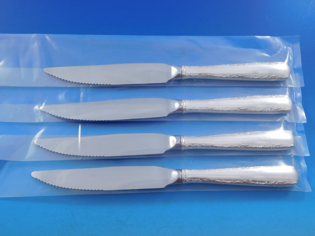 Gorham Camellia Sterling Silver Steak Knife Set 4pc Custom Made 8 3/4": Gorham Camellia Sterling Silver Steak Knife Set 4pc Custom Made 8 3/4" Enhance your dining experience with this exquisite 4-piece steak knife set from the Camellia pattern by Gorham. Crafted from ster