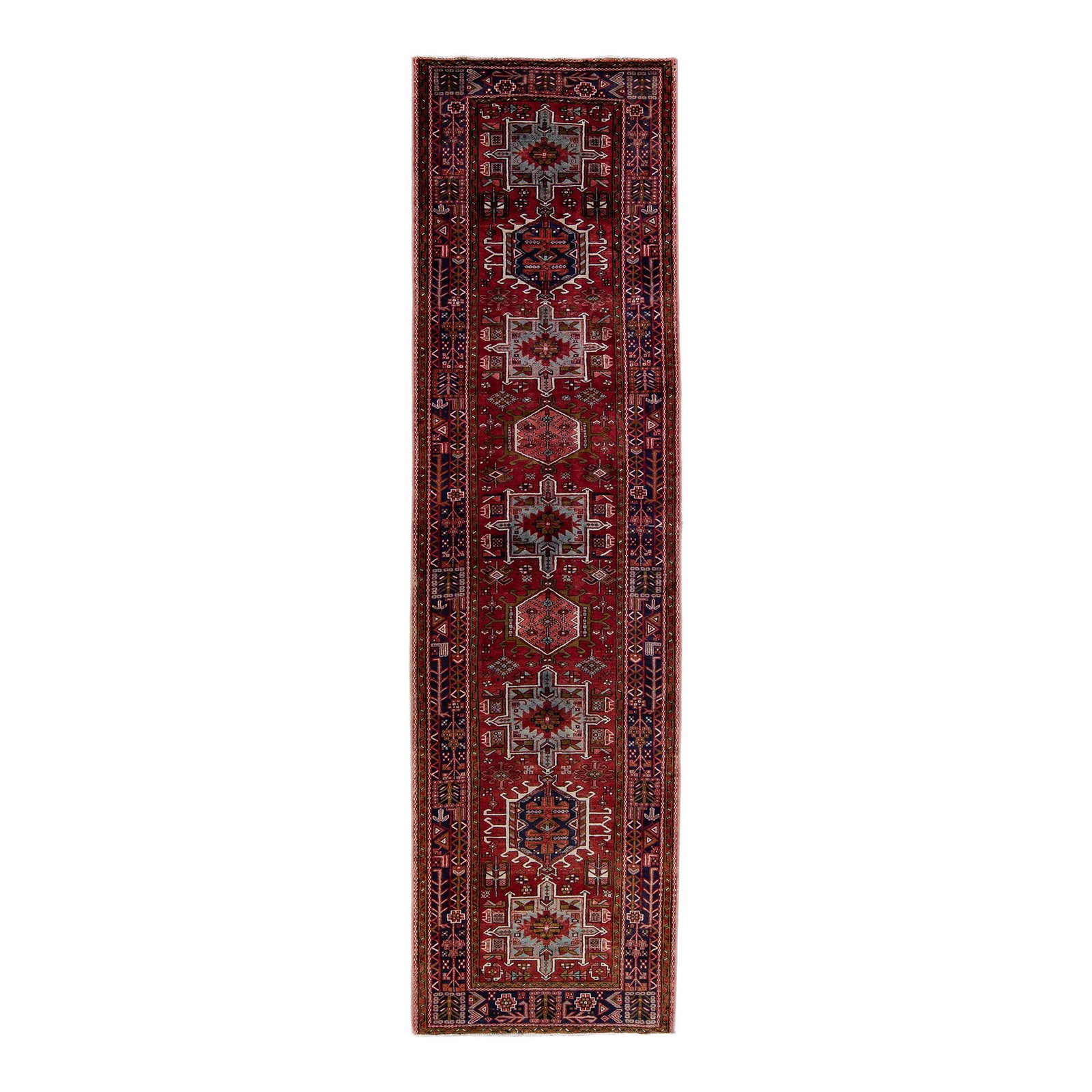 1960s Persian Heriz Handmade Wool Runner Red Medallion 4'1 x 14'9: 1960s Persian Heriz Handmade Wool Runner Red Medallion 4'1 x 14'9 This exquisite vintage Persian Heriz runner is hand-knotted from high-quality wool, showcasing a vibrant red field adorned with a stri