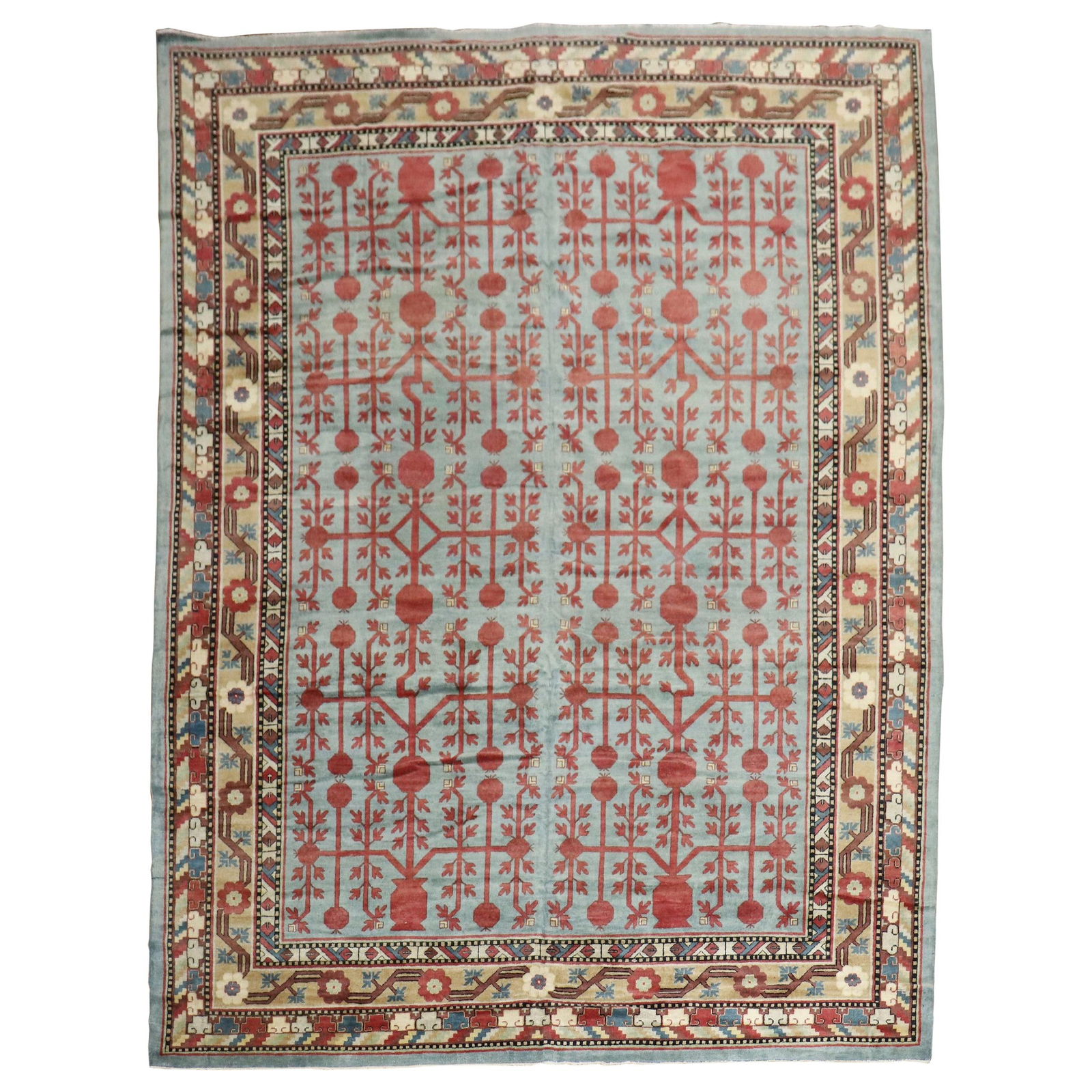 Vintage Hand-Woven Teal Khotan Rug with Pomegranate Design: Vintage Hand-Woven Teal Khotan Rug with Pomegranate Design This stunning teal antique Khotan rug showcases a classic large pomegranate design, beautifully hand-woven from high-quality wool. With a gen