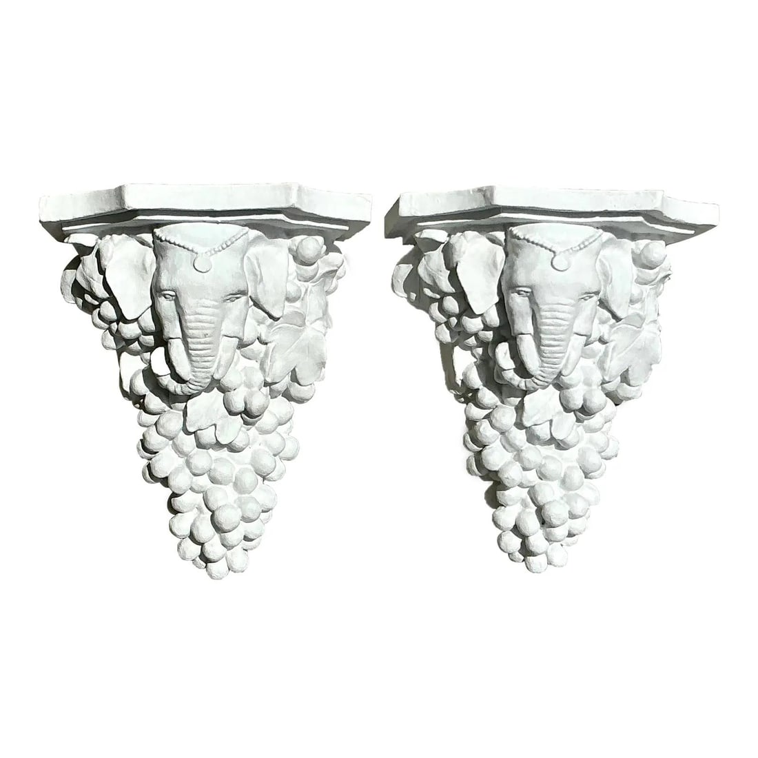 Pair of Vintage Boho Elephant Wall Brackets Decorative Art: Pair of Vintage Boho Elephant Wall Brackets Decorative Art Enhance your home with this striking pair of Vintage Boho Elephant Brackets. Each bracket showcases a beautifully molded elephant head, intri