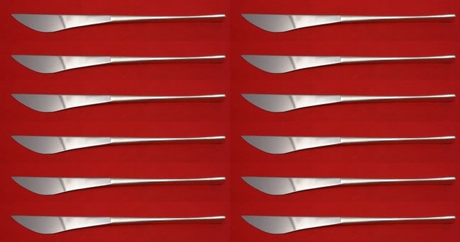 International Sterling Silver Vision Knife Set of 12 with Stainless Blades: International Sterling Silver Vision Knife Set of 12 with Stainless Blades Enhance your dining experience with this exquisite set of 12 Vision pattern knives by International Sterling. Each knife feat