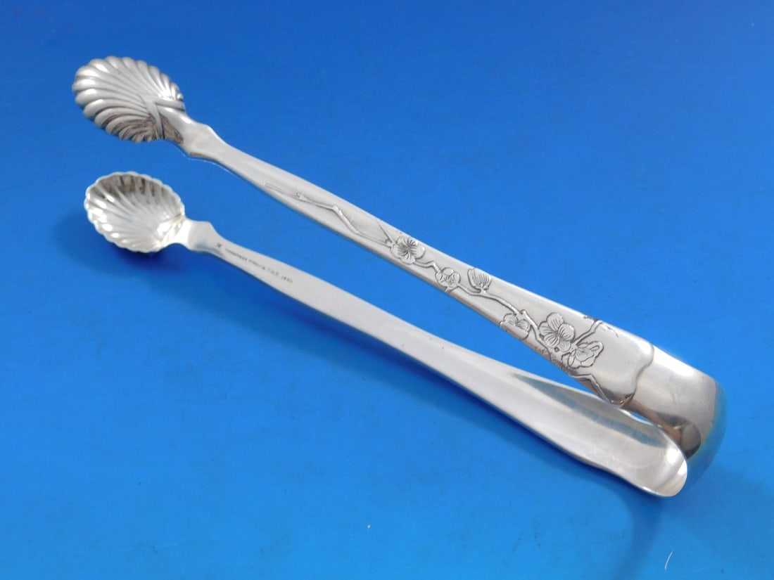 Tiffany Sterling Silver Ice Tong 6 Lap Over Edge Acid Etched Shell Motif: Tiffany Sterling Silver Ice Tong 6 Lap Over Edge Acid Etched Shell Motif This exquisite ice tong from Tiffany & Co. showcases the elegant Lap Over Edge pattern, featuring beautifully acid-etched shell
