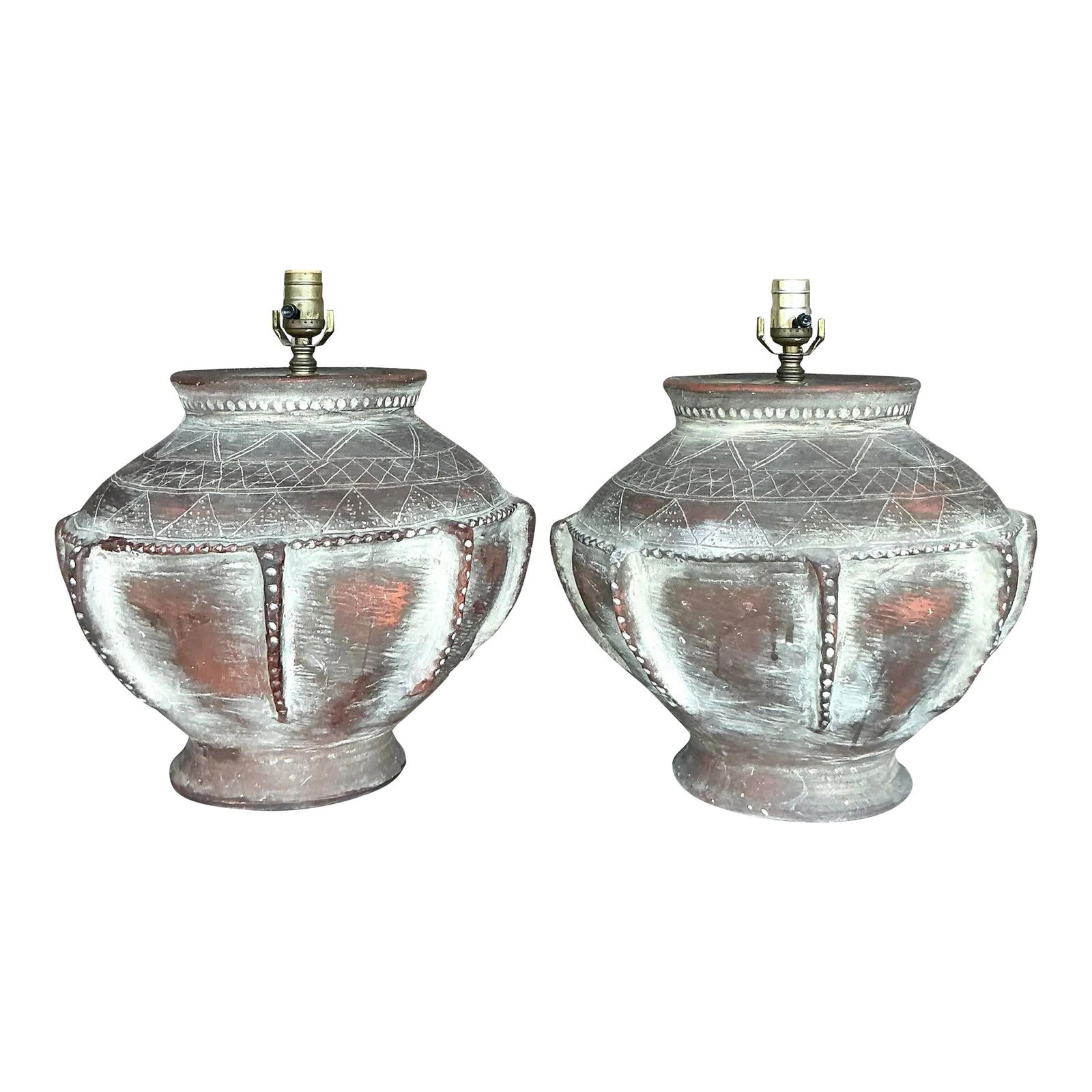 Pair of Vintage Boho Scored Terracotta Lamps Chestnut Finish: Pair of Vintage Boho Scored Terracotta Lamps Chestnut Finish Introduce a touch of earthy elegance to your home with this pair of Vintage Boho Scored Terracotta Lamps. Each lamp showcases a hand-sculpt