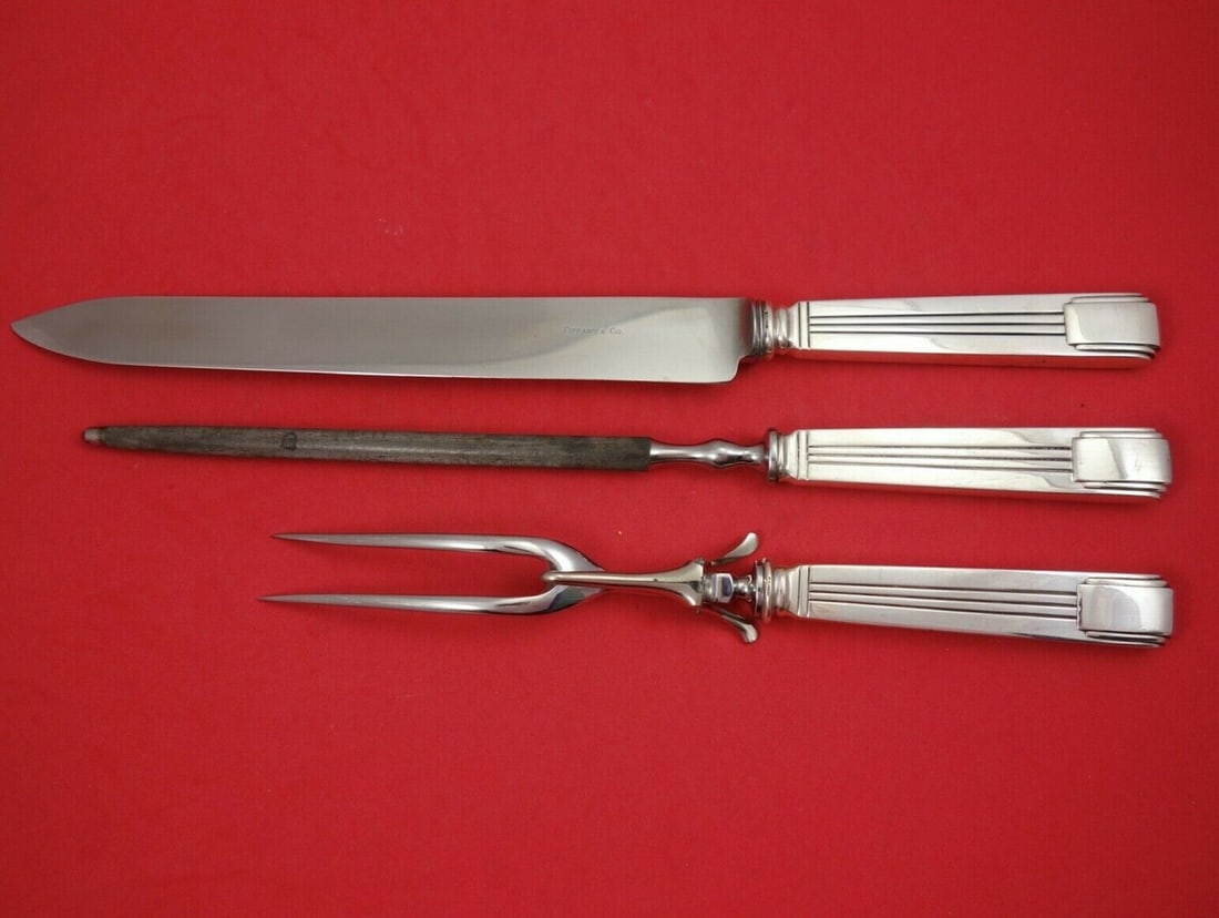Tiffany & Co Century Sterling Silver 3-Piece Roast Carving Set: Tiffany & Co Century Sterling Silver 3-Piece Roast Carving Set Enhance your dining experience with this exquisite 3-piece roast carving set from Tiffany & Co., crafted in the elegant Century pattern.