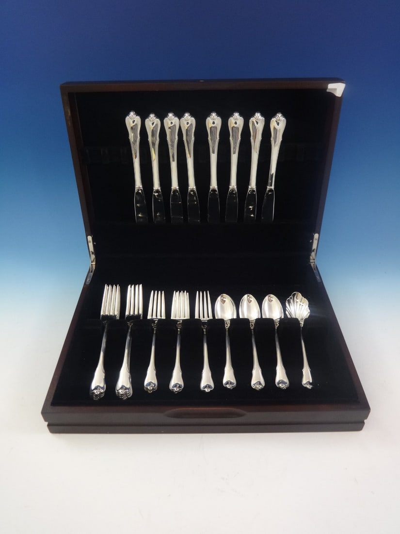 Grand Colonial Sterling Silver Flatware Set by Wallace 33 Pieces Service for 8: Grand Colonial Sterling Silver Flatware Set by Wallace 33 Pieces Service for 8 Elevate your dining experience with this exquisite Grand Colonial Sterling Silver Flatware Set by Wallace. This post-1940