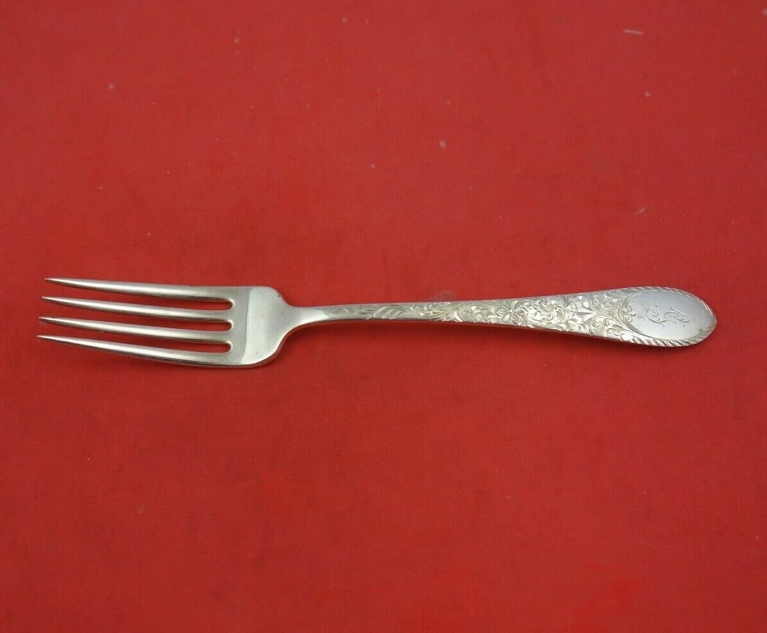 Gorham Colonial Engraved Sterling Silver Fork 7 Inch Heirloom: Gorham Colonial Engraved Sterling Silver Fork 7 Inch Heirloom This exquisite 7" fork is crafted from high-quality sterling silver by Gorham and features the elegant Colonial Engraved pattern. Ideal fo
