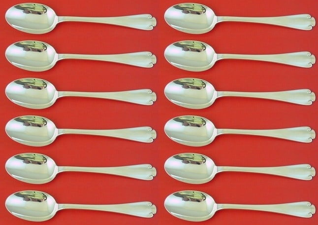 Tiffany & Co Flemish Sterling Silver Soup Spoon Set of 12 pcs 7": Tiffany & Co Flemish Sterling Silver Soup Spoon Set of 12 pcs 7" Enhance your dining experience with this exquisite set of 12 Flemish pattern soup spoons by Tiffany & Co. Each spoon is crafted from hi