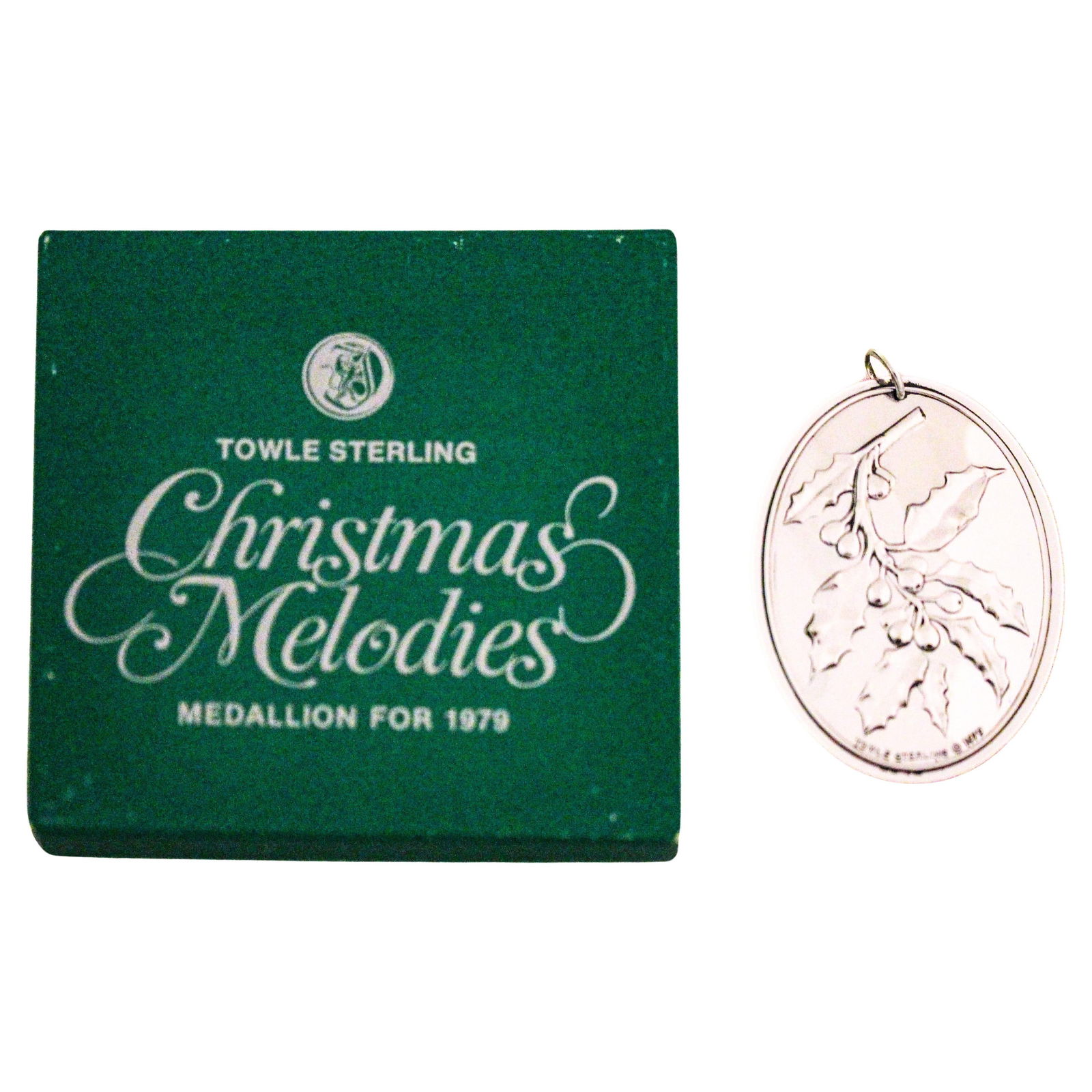 1979 Towle Sterling Silver Christmas Melodies Medallion Ornament: 1979 Towle Sterling Silver Christmas Melodies Medallion Ornament Celebrate the holiday season with the exquisite 1979 Towle Sterling "Christmas Melodies" Medallion. This stunning ornament is crafted f