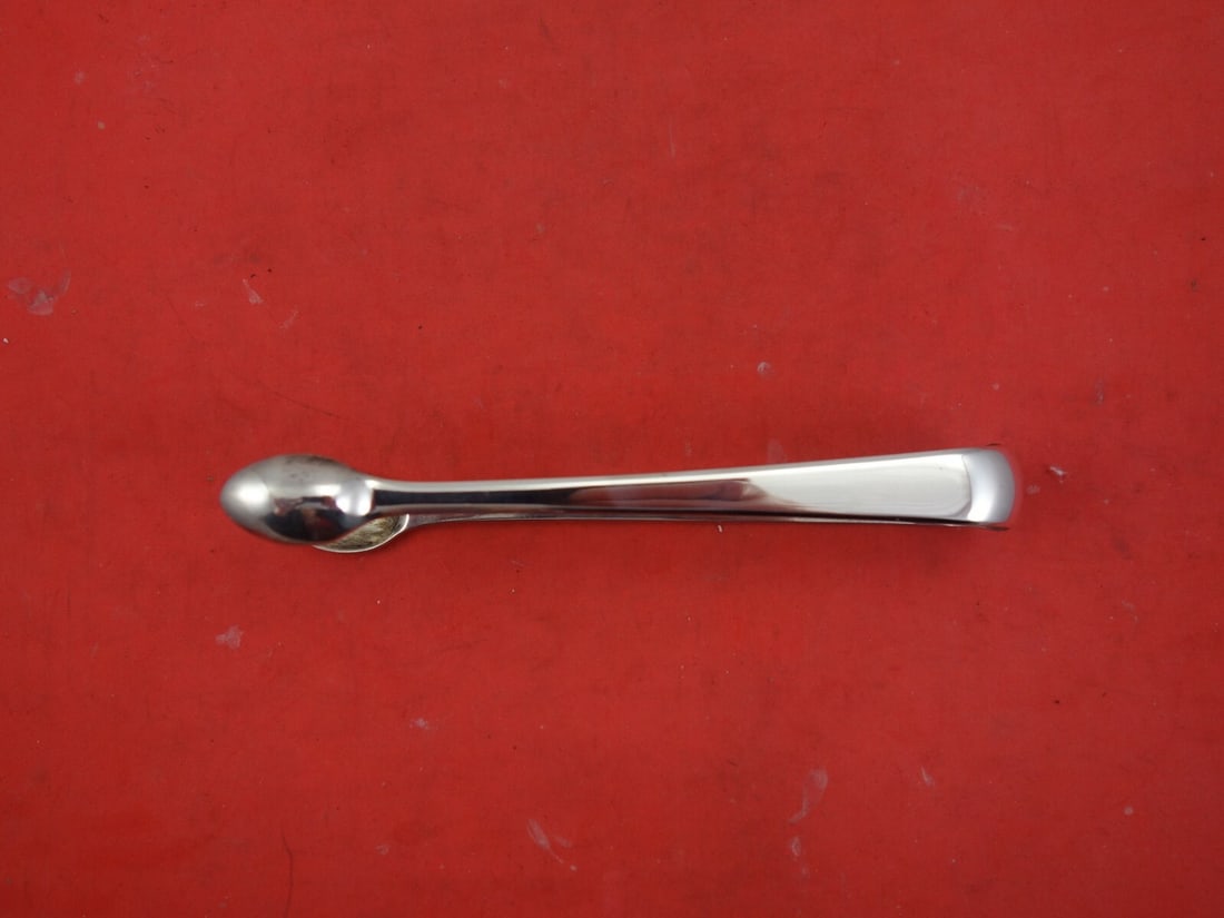 Georgian Sterling Silver Sugar Tongs London 1829 by WM Eley Fearn Chawer 5.5": Georgian Sterling Silver Sugar Tongs London 1829 by WM Eley Fearn Chawer 5.5" This exquisite English Georgian sterling silver sugar tong measures 5 1/2" and was crafted in London in 1829 by the esteem