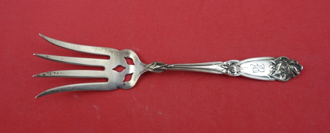 Alvin Fleur De Lis Sterling Silver Beef Fork 5.5 Inch Pierced Tines: Alvin Fleur De Lis Sterling Silver Beef Fork 5.5 Inch Pierced Tines This exquisite serving fork from Alvin's Fleur De Lis pattern is crafted from high-quality sterling silver. Featuring pierced splaye
