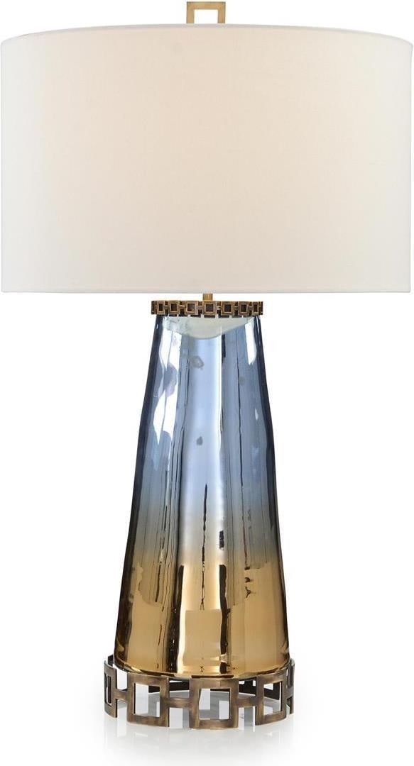 John-Richard Sapphire Blue Cognac Glass Table Lamp 35.25H: John-Richard Sapphire Blue Cognac Glass Table Lamp 35.25H Illuminate your space with the Sapphire Blue Cognac Glass Lamp, a stunning piece of elegance and functionality. This table lamp features a str