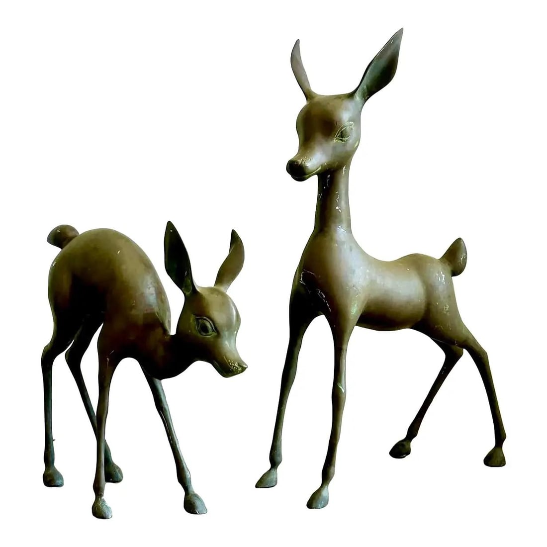Pair of Brass Modernist Deer Sculptures with Boho Style Set of 2: Pair of Brass Modernist Deer Sculptures with Boho Style Set of 2 This set of two vintage brass deer sculptures features elongated legs and simplified forms, embodying a modernist aesthetic. The standi