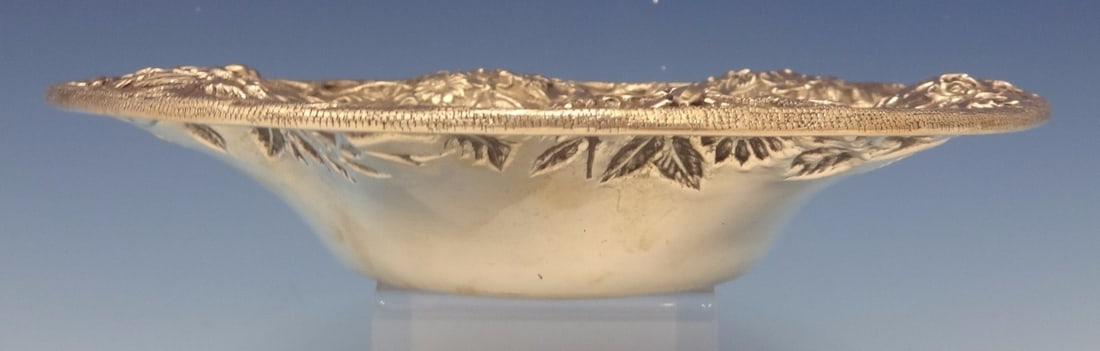 Kirk Repousse Sterling Silver Fruit Bowl 9 Diameter EMJ Monogram 1896-1924: Kirk Repousse Sterling Silver Fruit Bowl 9 Diameter EMJ Monogram 1896-1924 This exquisite repousse fruit bowl by Kirk is crafted from sterling silver, showcasing the traditional art of repousse, where