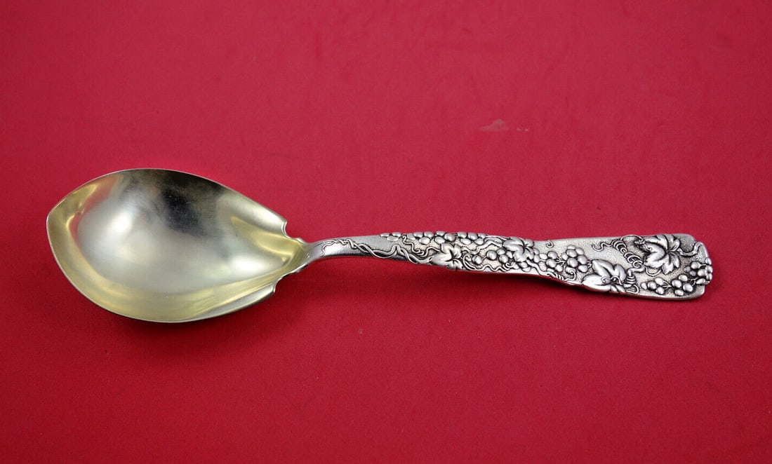 Tiffany & Co. Vine Sterling Silver Berry Spoon 9.5 Gold-Washed Grapevine Motif: Tiffany & Co. Vine Sterling Silver Berry Spoon 9.5 Gold-Washed Grapevine Motif This exquisite Vine by Tiffany serving spoon is a remarkable piece of sterling silverware, dating back to 1850-1899. Craf
