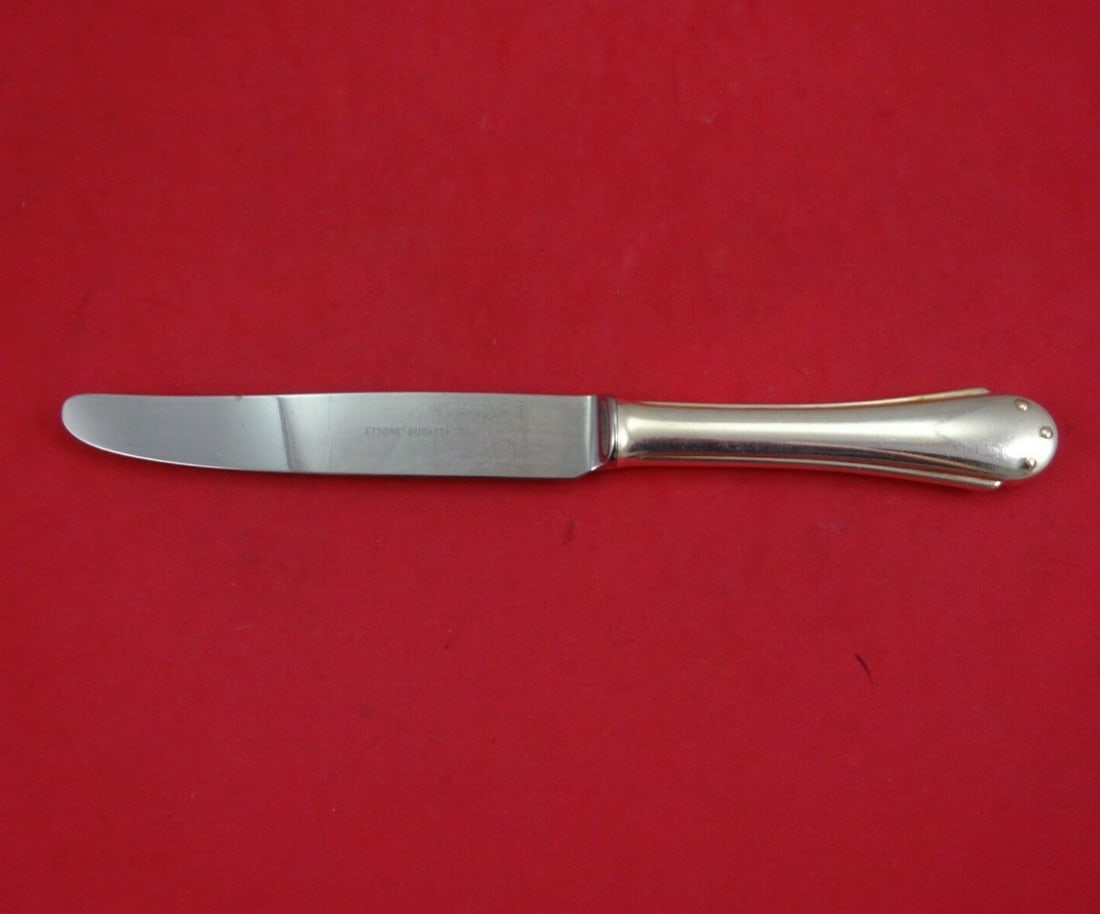 Bugatti Ettore Sterling Silver Dinner Knife 9 3/4 Inch Flatware: Bugatti Ettore Sterling Silver Dinner Knife 9 3/4 Inch Flatware Elevate your dining experience with the Ettore by Bugatti dinner knife, a stunning piece of flatware crafted in Italy. This 9 3/4" knife