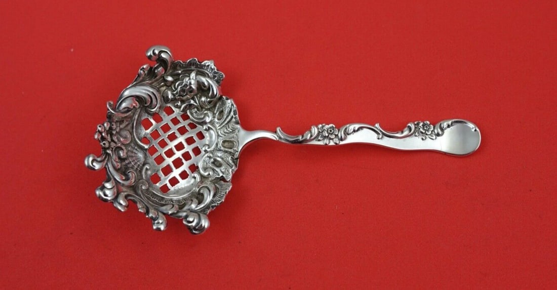 Shiebler Sterling Silver Nut Spoon Unknown Pattern 4.5": Shiebler Sterling Silver Nut Spoon Unknown Pattern 4.5" This exquisite sterling silver nut spoon by Shiebler measures 4 1/2 inches in length. The serving spoon features an unknown pattern, showcasing