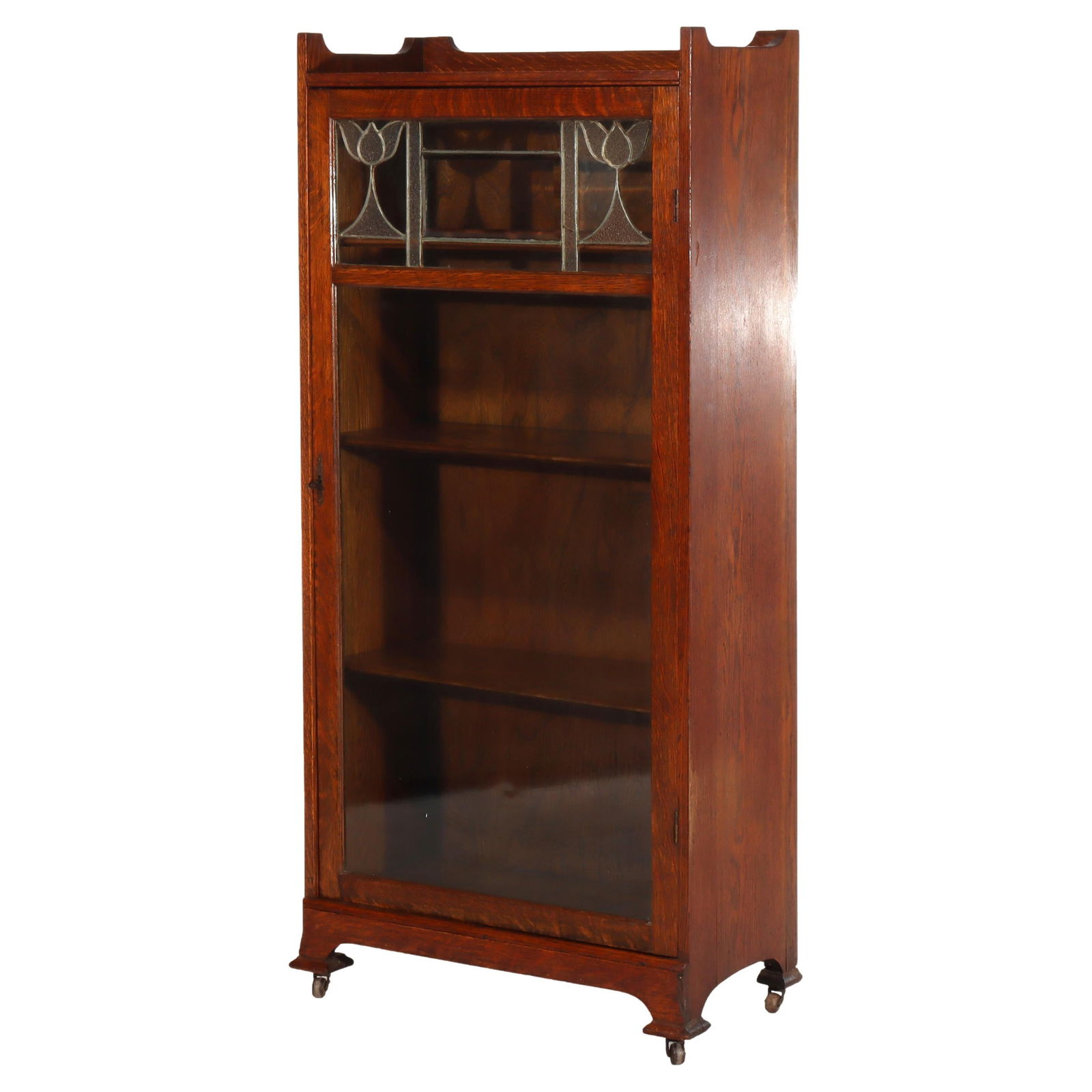 Antique Mission Oak Bookcase with Leaded Glass Floral Design c1920: Antique Mission Oak Bookcase with Leaded Glass Floral Design c1920 This exquisite Antique Arts & Crafts Mission Oak Leaded Glass Single Door Bookcase, crafted around 1920, showcases the elegance of ea