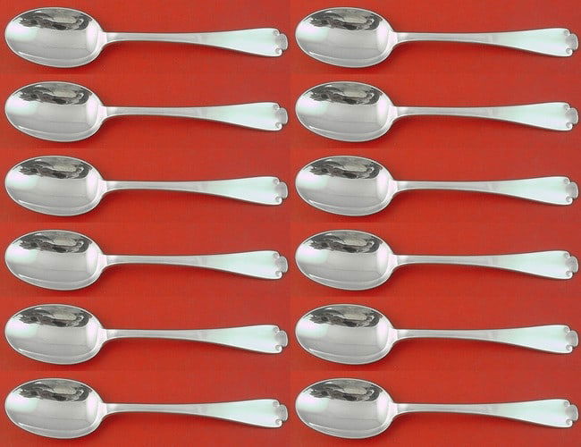 Tiffany & Co Flemish Sterling Silver Teaspoon Set of 12: Tiffany & Co Flemish Sterling Silver Teaspoon Set of 12 Elevate your dining experience with this exquisite set of 12 Flemish teaspoons by Tiffany & Co. Each spoon, measuring 5 7/8" long, showcases the
