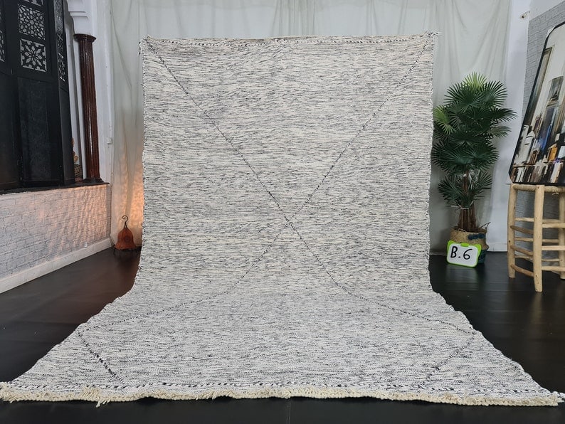 Authentic Handmade Moroccan Berber Rug 9.84 x 6.56 Feet 100% Wool: Authentic Handmade Moroccan Berber Rug 9.84 x 6.56 Feet 100% Wool Experience the beauty of this stunning authentic handmade Moroccan Berber rug. Handwoven in the Atlas Mountains by skilled local Berbe
