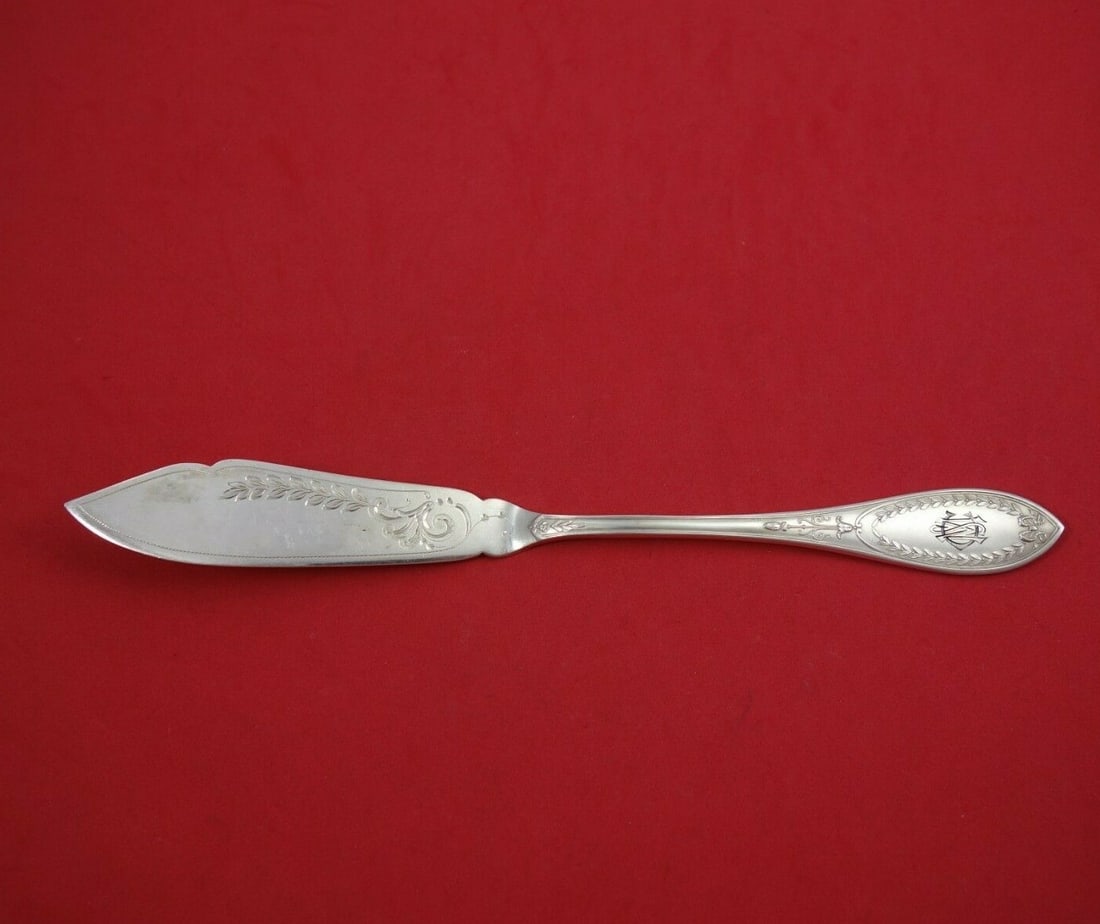 Bruckmann Sohne Sterling Silver Bright-Cut Fish Knife 8 7/8": Bruckmann Sohne Sterling Silver Bright-Cut Fish Knife 8 7/8" This exquisite Bruckmann and Sohne fish knife, crafted between 1900 and 1940, showcases the elegance of German sterling silver. The knife f